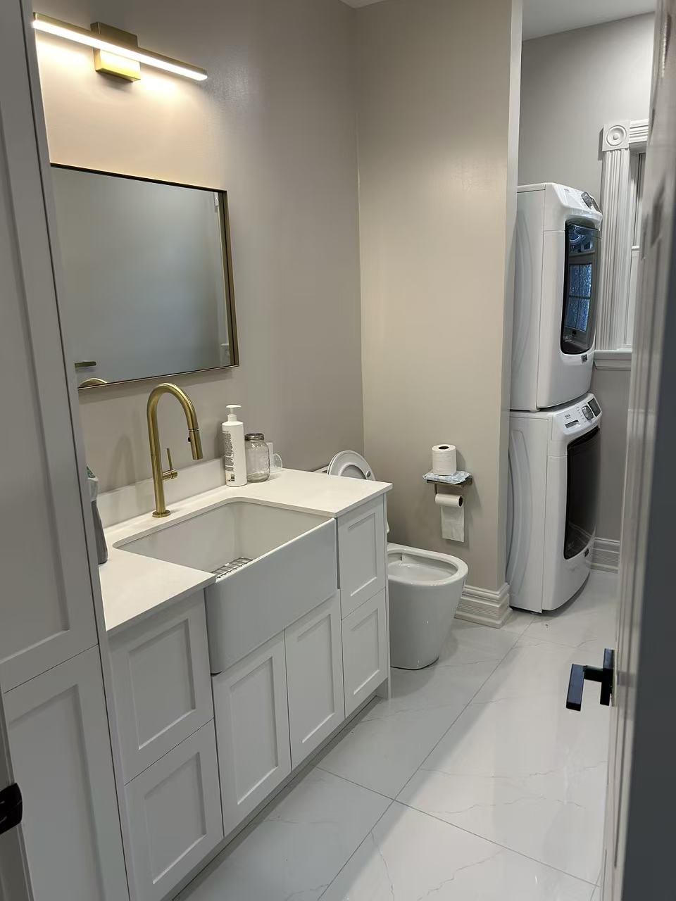 Glass enclosure and custom mosaic shower floor
