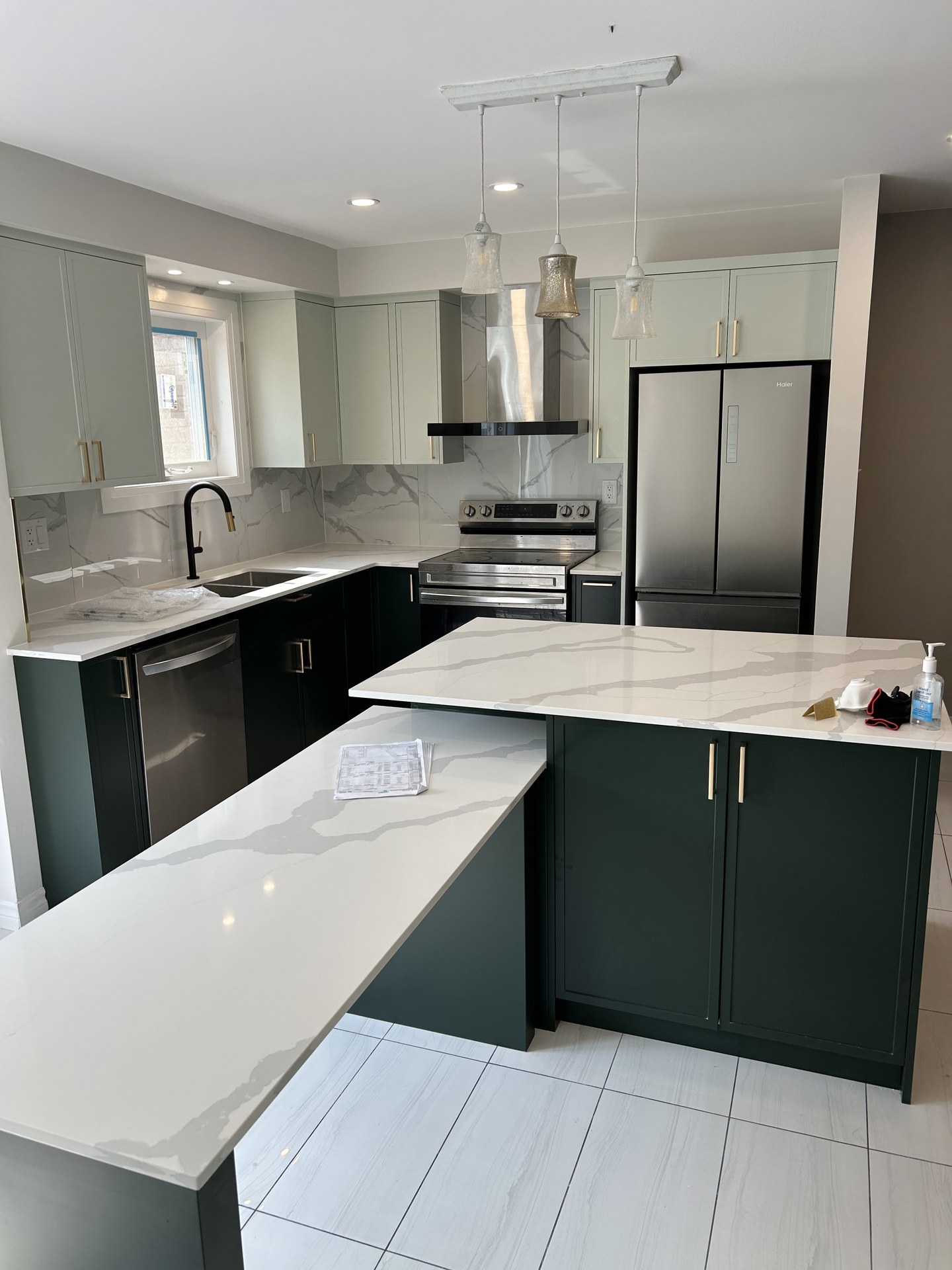 Modern open concept kitchen renovation with custom island