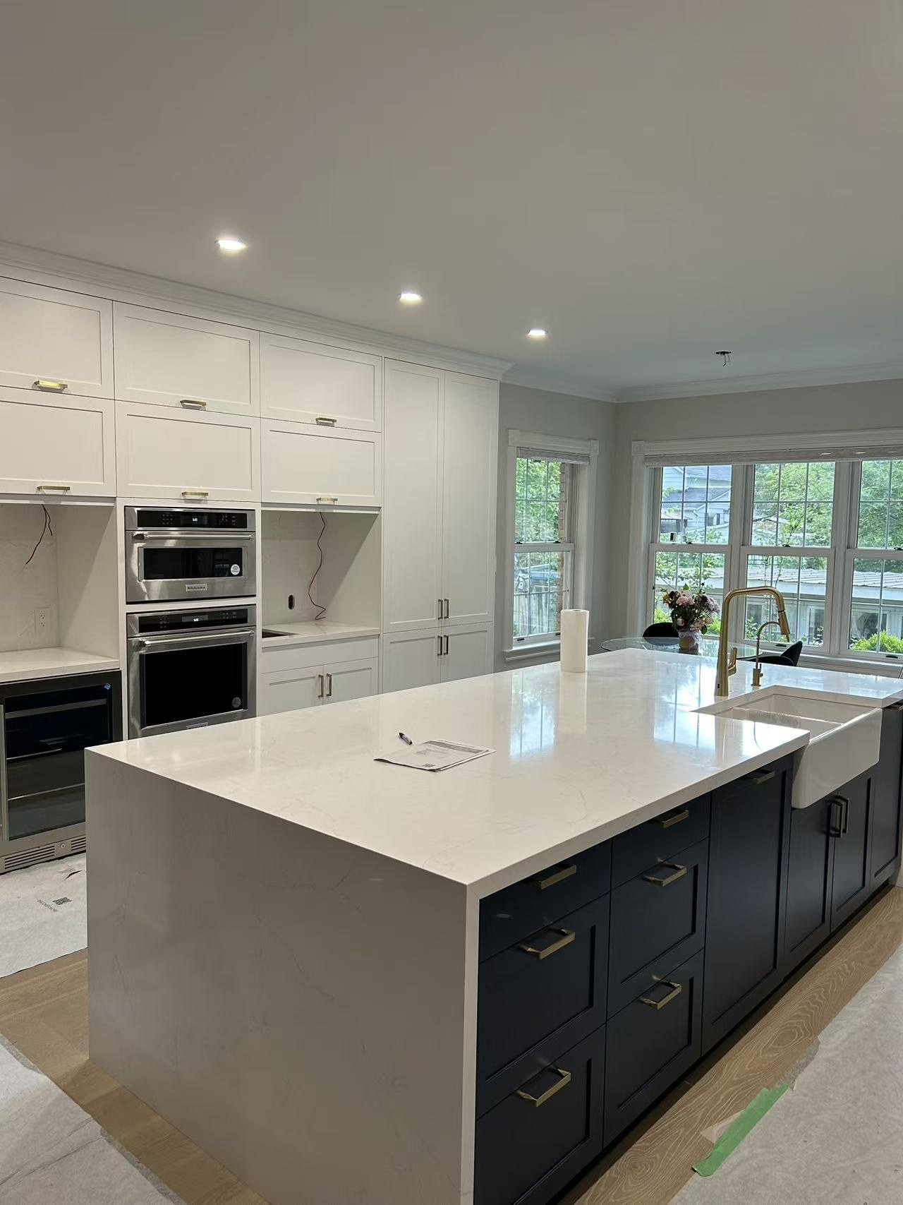 Custom kitchen island detail and seating layout