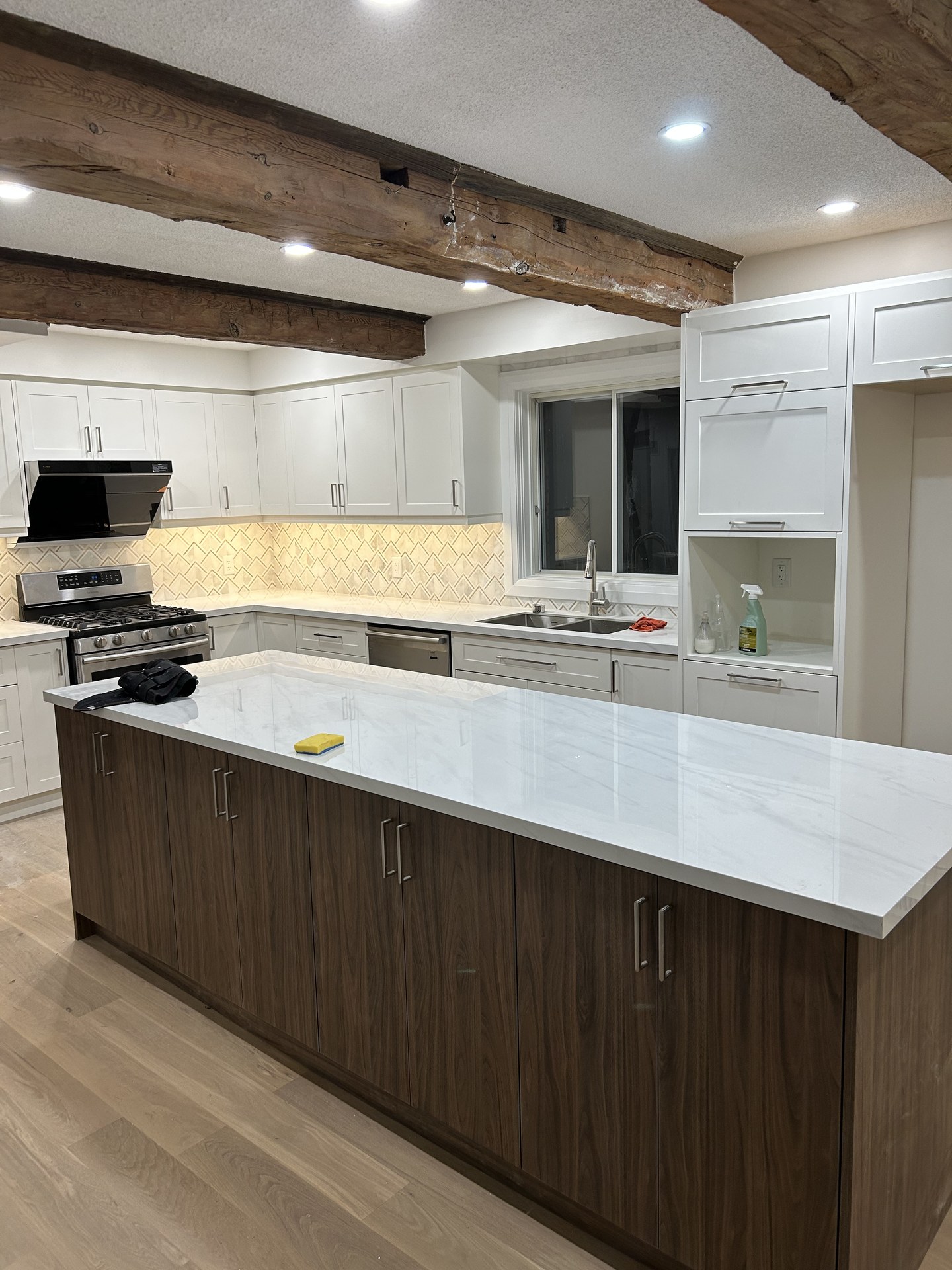Panoramic view of luxury custom kitchen and dining space